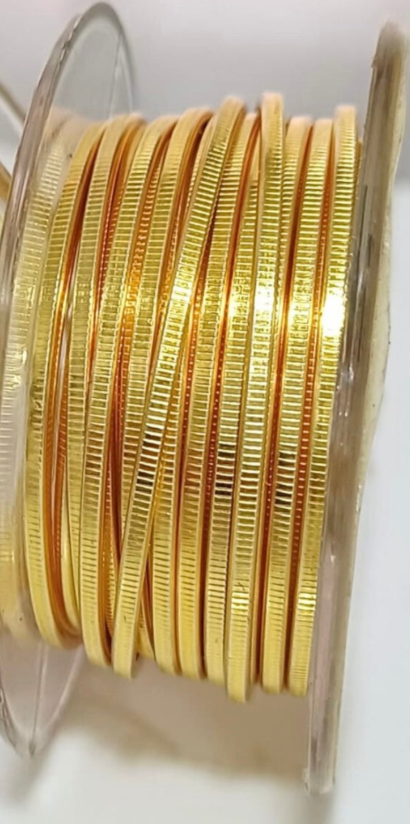 Gold-colored textured Flat wire, Hammered and Nidus model. AMERICRAFT SUPPLY brand.  Collection 2024