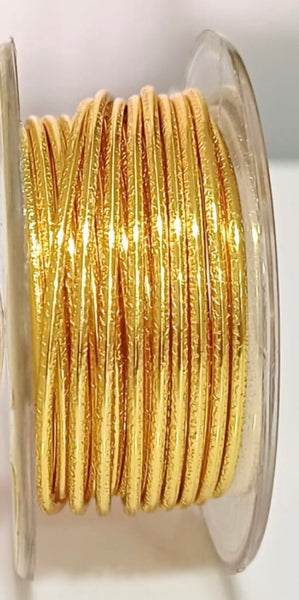 Gold-colored textured round wire, Hammered and Nidus model. AMERICRAFT SUPPLY brand.