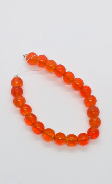 Tiras translúcidas naranjas de cristal de Murano