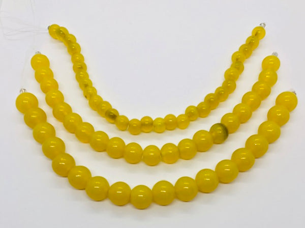 Tiras amarillas translúcidas de cristal de Murano