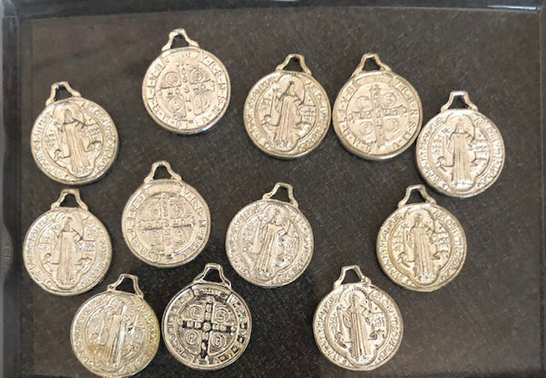 Silver pendant in fantasy of Saint Benito